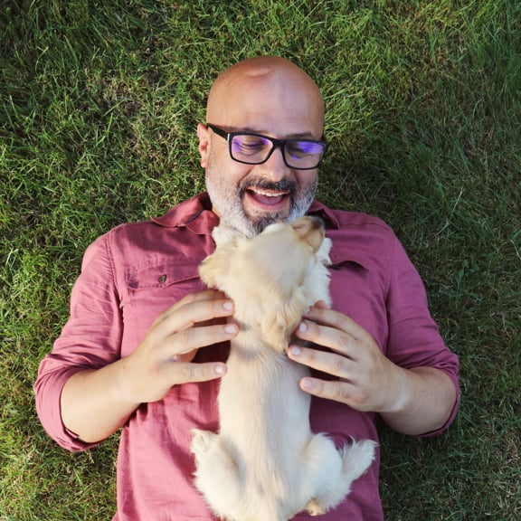 Man with dog on grass
